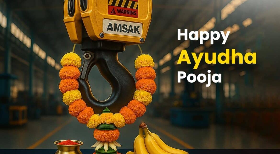 Amsak Cranes team during Ayutha Pooja 2025 with decorated cranes and tools